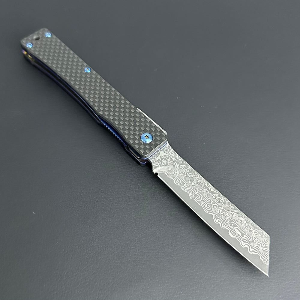 
                  
                    Hikari Folding Knife AUS8 Stainless Steel Damascus Carbon Fibre Handle
                  
                