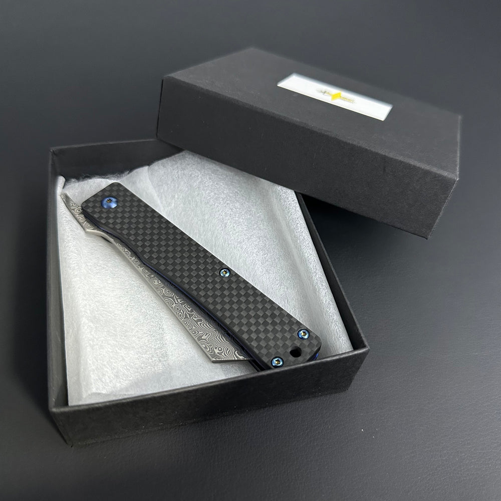 
                  
                    Hikari Folding Knife AUS8 Stainless Steel Damascus Carbon Fibre Handle
                  
                