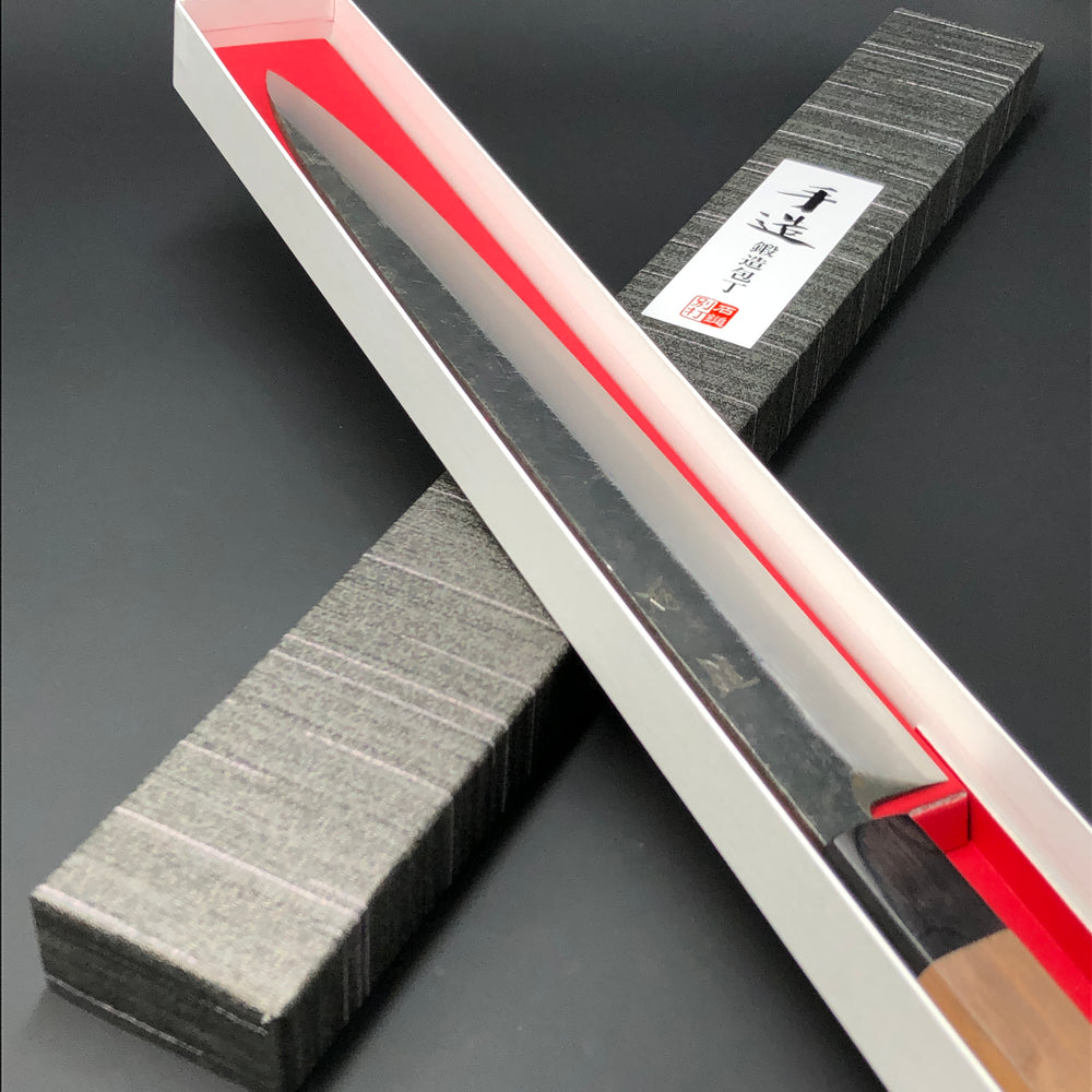 
                  
                    Yanagiba Kurouchi Black finished 300mm (11.8in) Aogami (Blue) No.2 Single-Bevel
                  
                